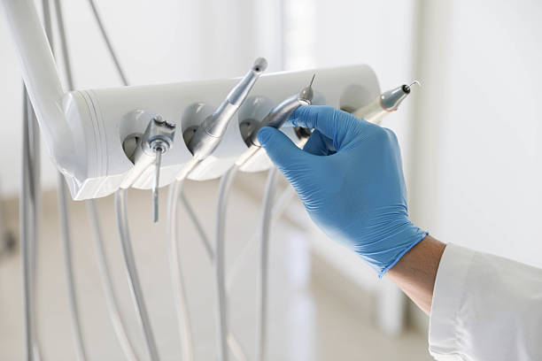 Professional Tooth Extraction technician working in Lehigh Acres, FL